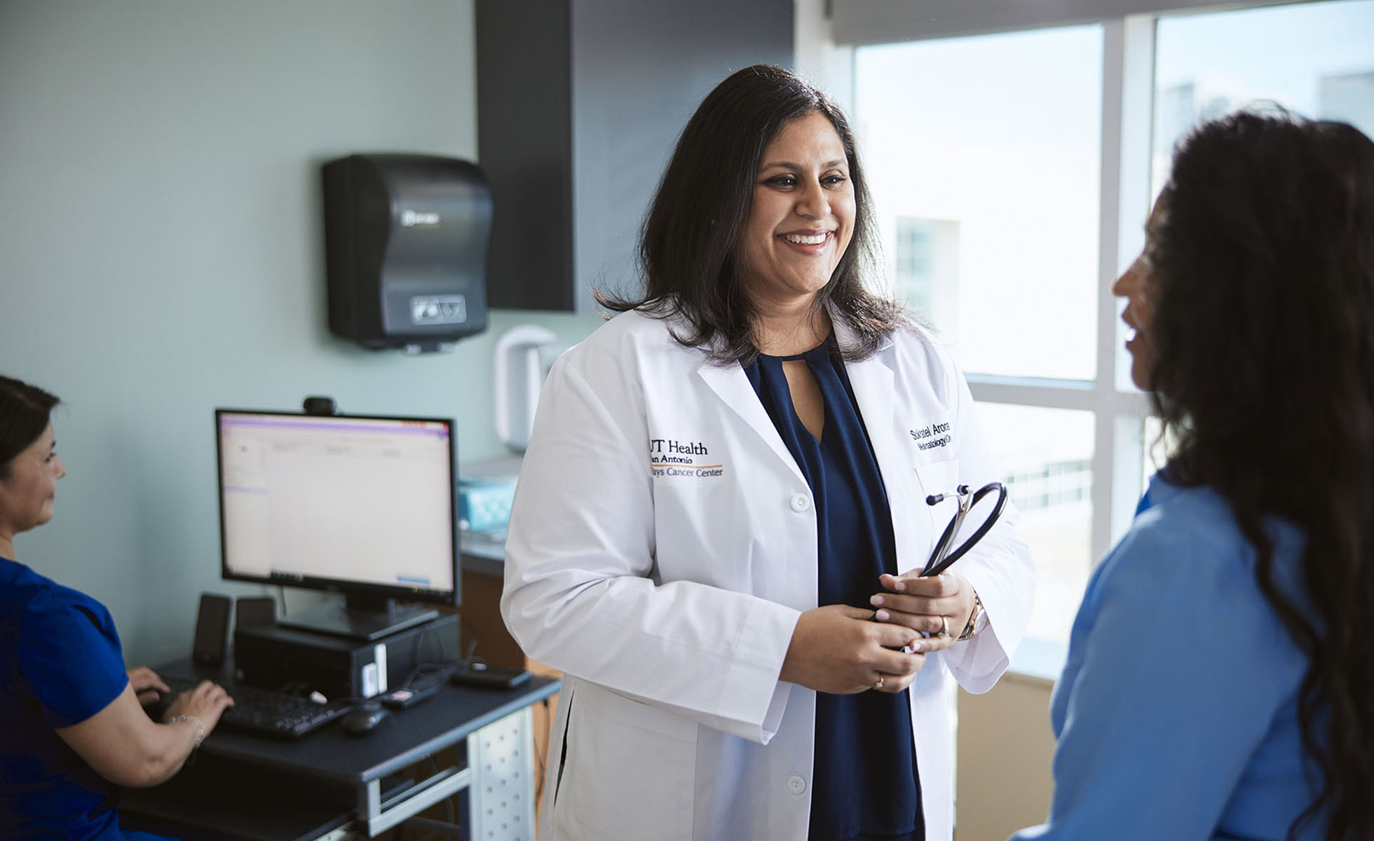 A doctor talking to a patient