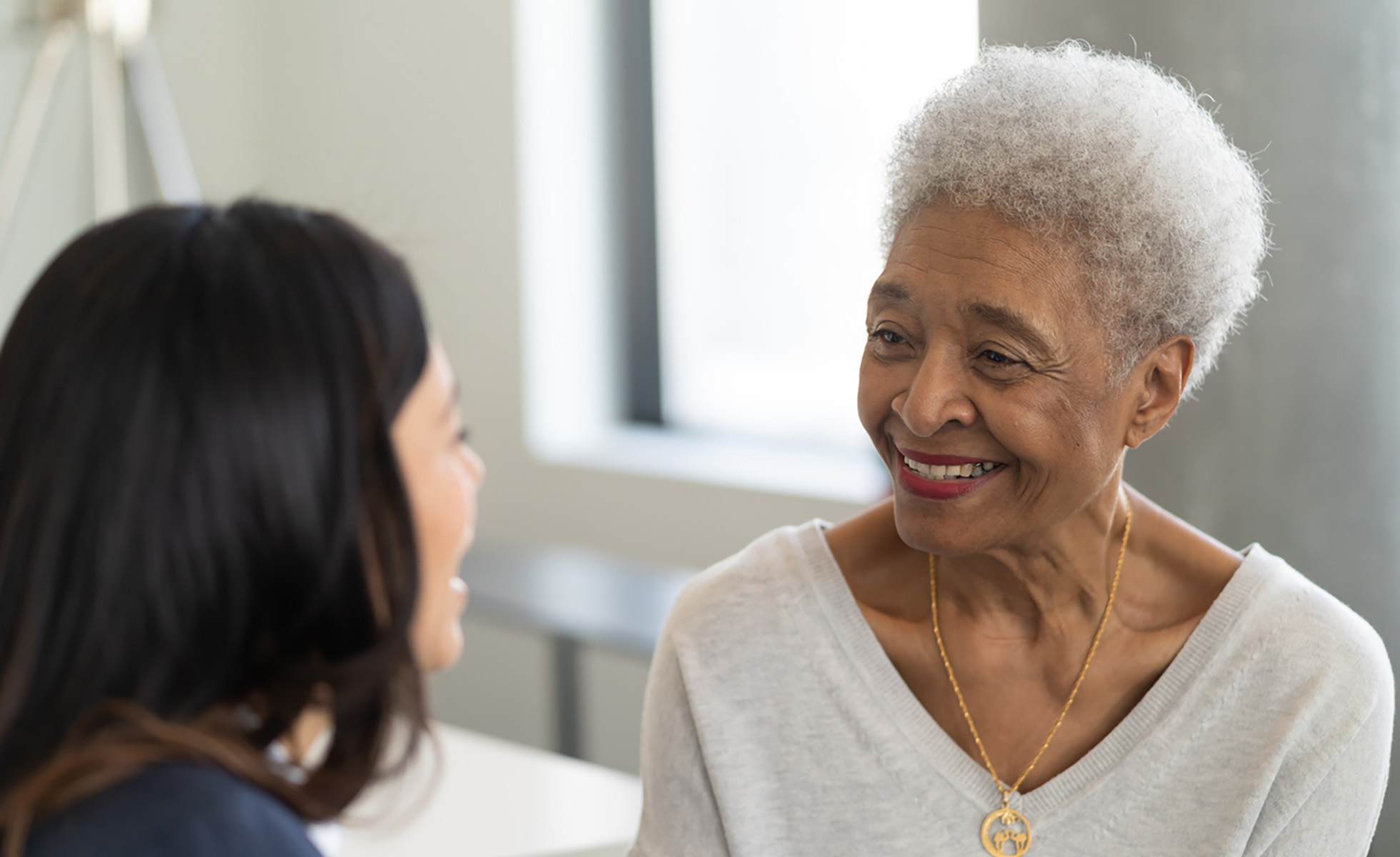 a patient talking to her doctor