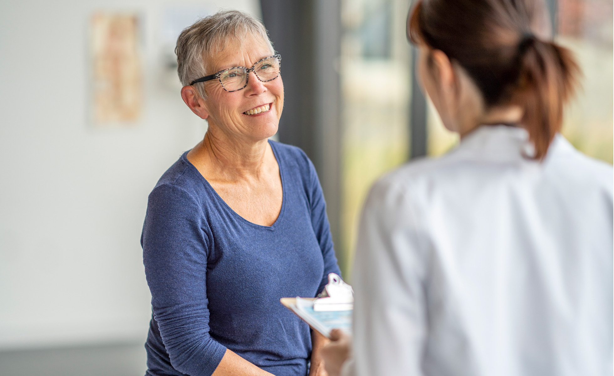 a patient talking to her doctor